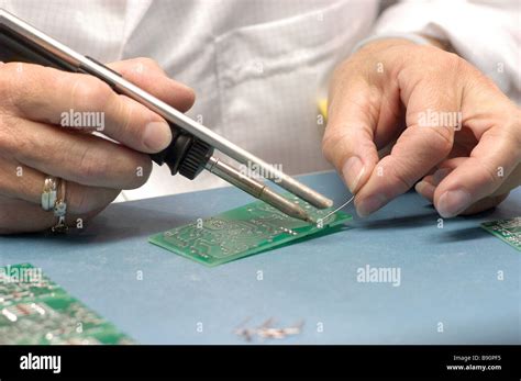 soldering an electronic circuit board Stock Photo - Alamy