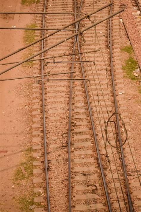 View Of Train Railway Tracks From The Middle During Daytime At