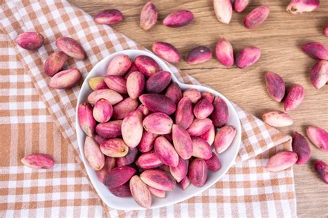 Premium Photo Fresh Raw Pistachio Nuts In Shell Natural Background