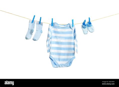 Baby Clothes Hanging On White Background Stock Photo Alamy