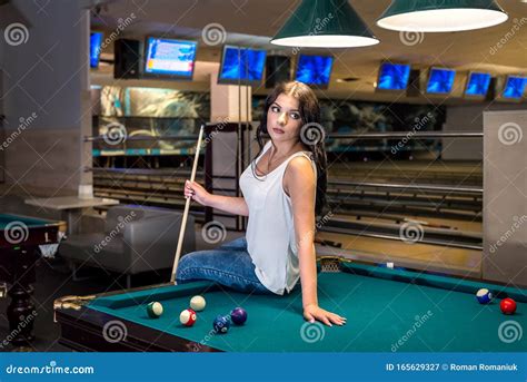 Brunette Woman With Cue Near Billiard Table Stock Image Image Of