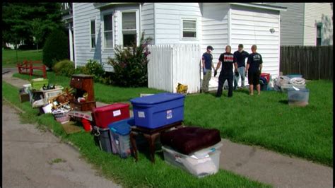 Firefighters Help Norwood Residents Clean Up After Flooding