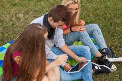 Three Friends Playing Game On Tablet Pc They Winning Again Stock