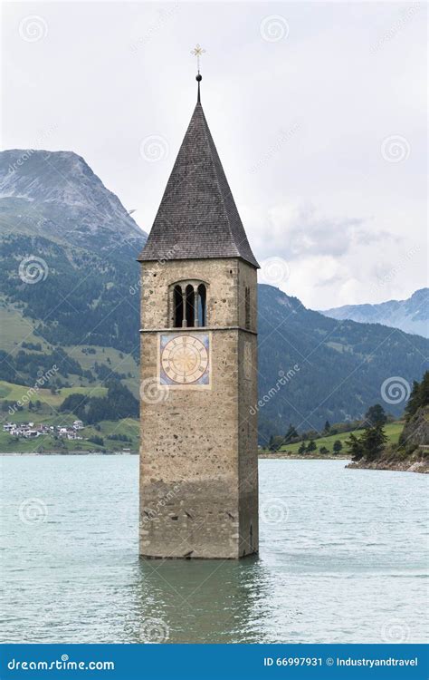 Church Tower in Lake Reschen, Italy Stock Image - Image of mountain, sunlight: 66997931