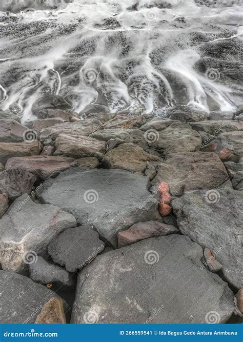 Black Rock with Water Flowing Stock Image - Image of waterfall, nature