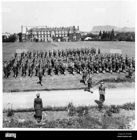 An A T S Officer Cadet Training Unit A Rehearsal For Passing Out Parade Showing Cadets