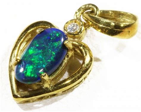 Black Opal Set In 18k Gold Pendant CF 1165 Gold Opal Pendant White