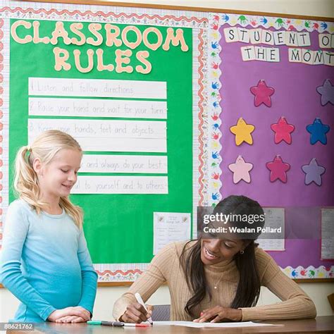 teacher grading homework   premium high res pictures getty