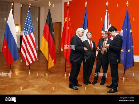 German Foreign Minister Frank Walter Steinmeier L Chats With His His