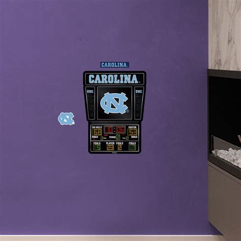 there is a purple wall with the north carolina university logo on it ...