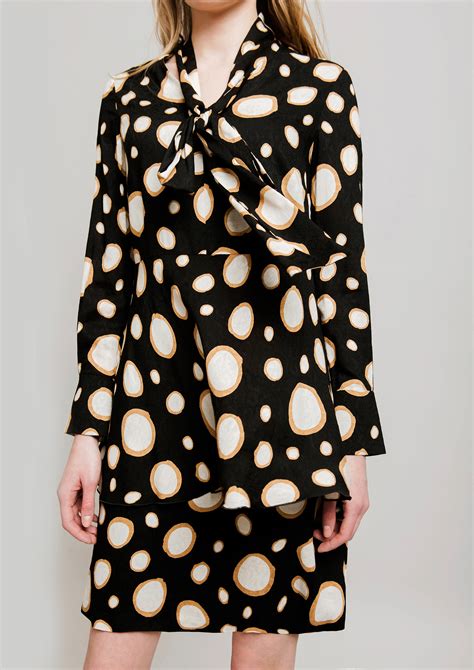 Circle print dress in black.