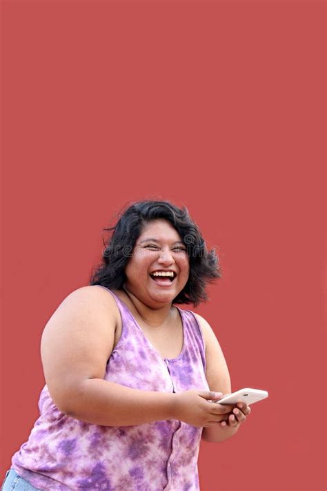 Year Old Fat Brunette Latina Woman Uses Her Cell Phone To Send Messages Shop And Date