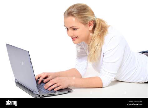 Attractive Blonde Woman Lying On Floor Using Notebook Computer All On White Background Stock