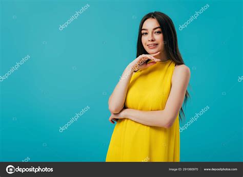 Happy Beautiful Girl Yellow Dress Touching Face Isolated Turquoise