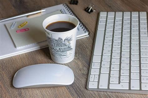 Premium Photo Notebooks Paper Clips With A Pen And Coffee On A Wooden