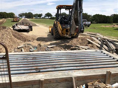 Cattle guard install - Central Texas Steel Buildings