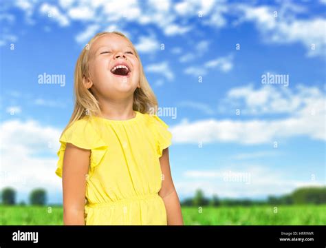 Very Happy Child Laughing Outdoors Stock Photo Alamy