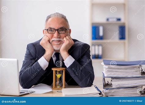 Old Male Employee In Time Management Concept Stock Image Image Of