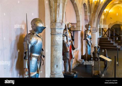 Old castle interior with knight's armor, Europe Stock Photo - Alamy