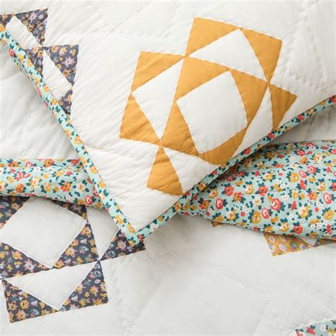 Misha Puff Patchwork Triangle Quilt Shams West Elm