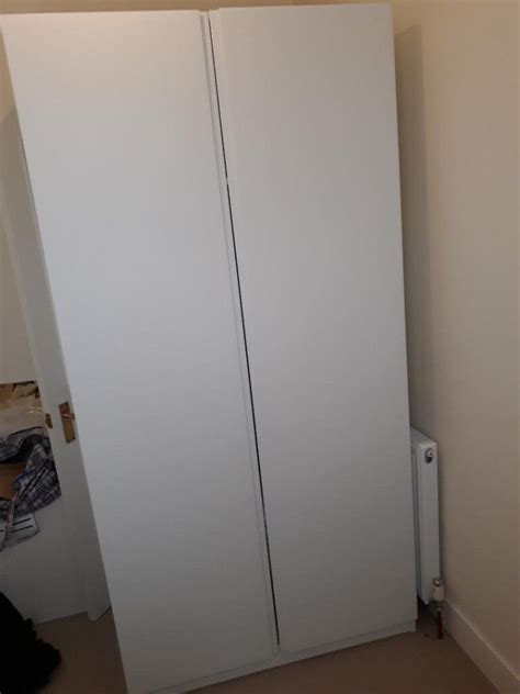 Ikea White Pax Wardrobe With Integral Door Handles Soft Closing Hinges Internal Shelf And Rail