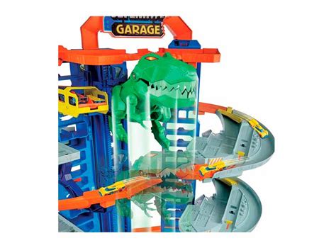Ripley HOT WHEELS JUEGO DE PISTAS DE AUTOS DE JUGUETE CITY ULTIMATE GARAGE MOVING T REX DINOSAUR