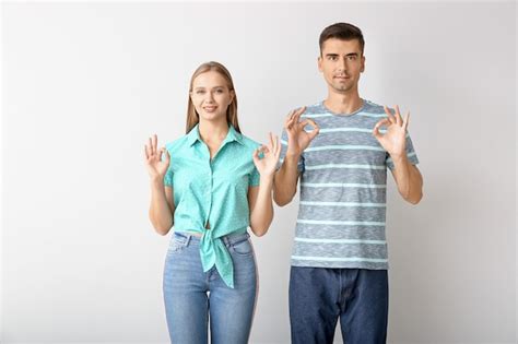 Premium Photo Young Deaf Mute Couple Using Sign Language On White