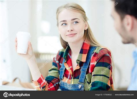 Happy Girl Glass Hot Drink Talking Her Groupmate Stock Photo Pressmaster