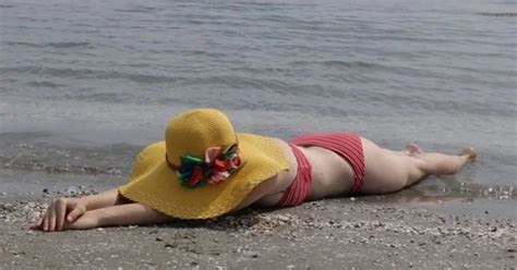 Attractive Woman In Bikini Lying On Sand Stock Video Pond5