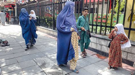 Afghan Women Defy Taliban S Burqa Law Teller Report