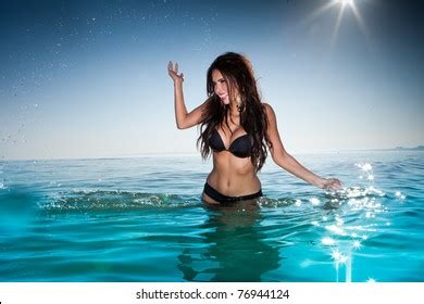 Sexy Brunette Woman Water Wearing Bikini Stock Photo Edit Now 76944124