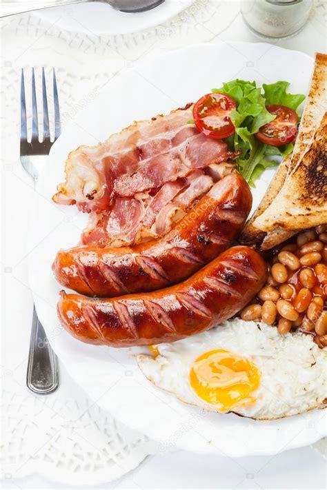 Full English Breakfast With Bacon Sausage Fried Egg And Baked Beans