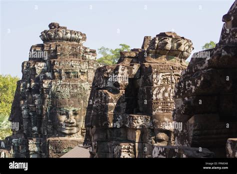 Stone Head On Towers Of Bayon Temple In Angkor Thom Cambodia Stock