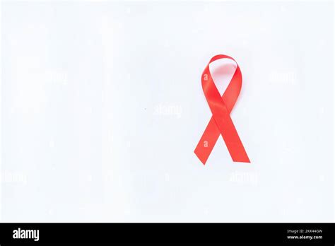 Red Ribbon On Isolate White Background Aids Awareness Concept Of World