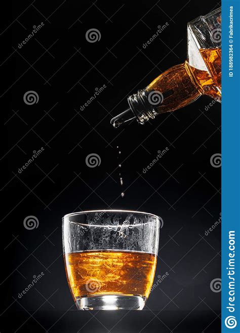 Whisky Pouring Into Glass Stock Image CartoonDealer 8152147