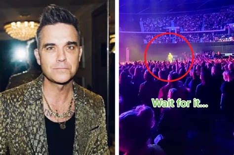 Robbie Williams Arremessa Camiseta Muito Longe Mesmo Em Show E