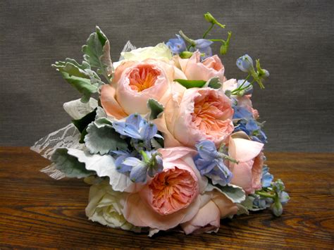 Peach And White Garden Roses Light Blue Delphinium And Dusty Miller