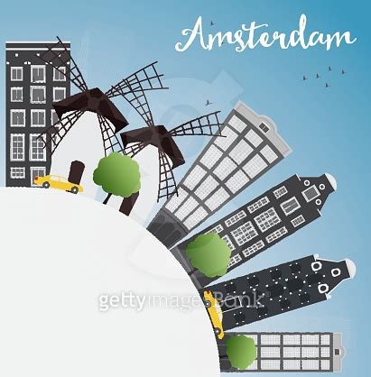 Amsterdam city skyline with grey buildings and blue sky 이미지 499854474