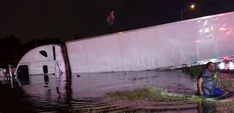 Driver Ok After Semi Truck Crashes Into Retention Pond