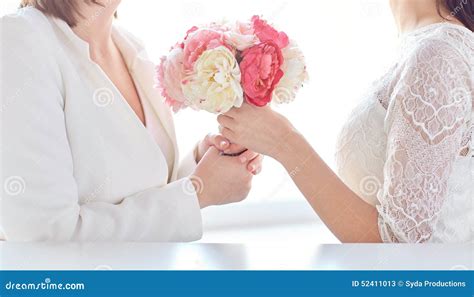 Close Up Of Happy Lesbian Couple With Flowers Stock Image Image Of Beautiful Hands
