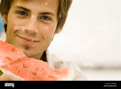 Man Holding Slice Of Watermelon Stock Photo Alamy