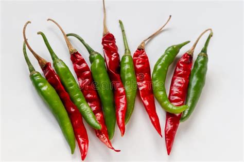 Red And Green Chilli Pepper Combine Together Isolated In A White