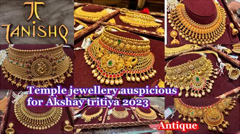 Tanishq Latest Temple Finish Gold Necklace Set With Stonestemple