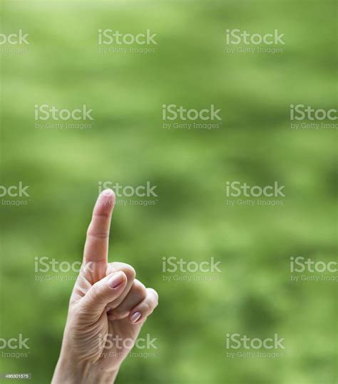 Female Hand Pointing Up To Copy Space Stock Photo Download Image Now