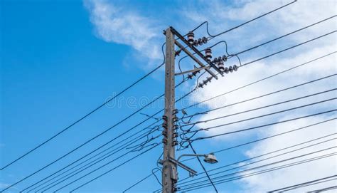 Electric Pole Power Lines And Wires With Blue Sky Stock Photo Image