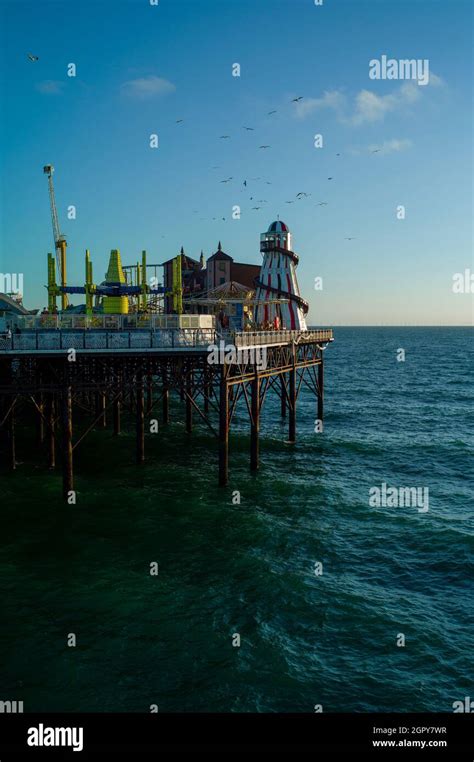 Brighton Palace Pier rides and attractions Stock Photo - Alamy