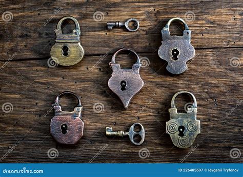 Collection Of Antique Door Locks And Keys On An Old Board Vintage