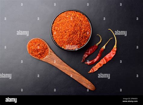 Ground Red Chilli In Bowl And Spoon Stock Photo Alamy