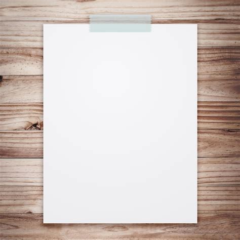 Premium Photo Empty White Paper Sheet On Wood Background