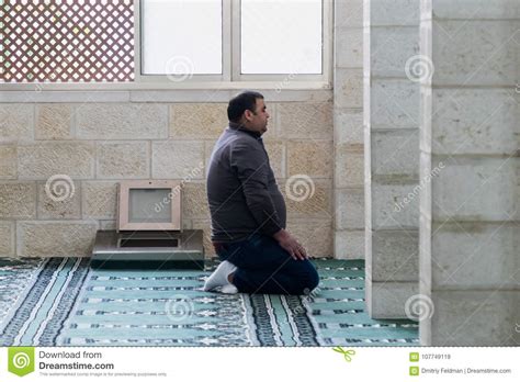 A Believing Muslim Prays In The White Mosque Al Abiad In The Old City